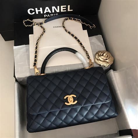 replica chanel charming navy|Chanel handbag dupe.